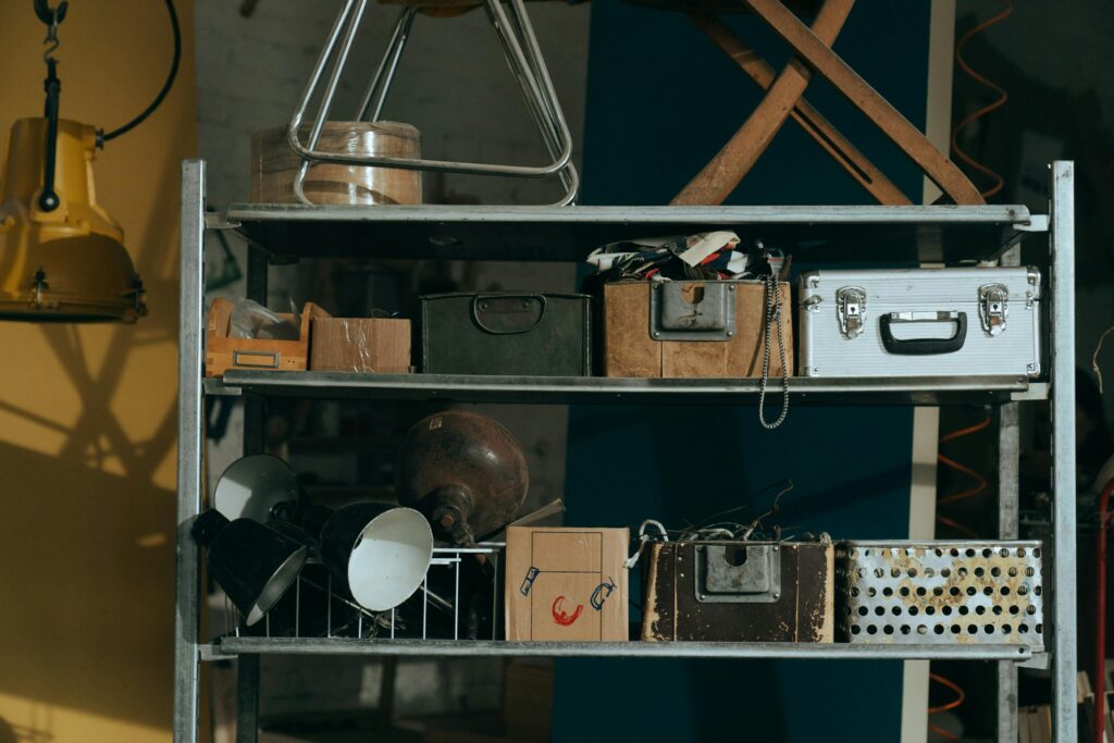 shelving unit with various boxes and knick-knacks | Outdoor Storage Shed Organization